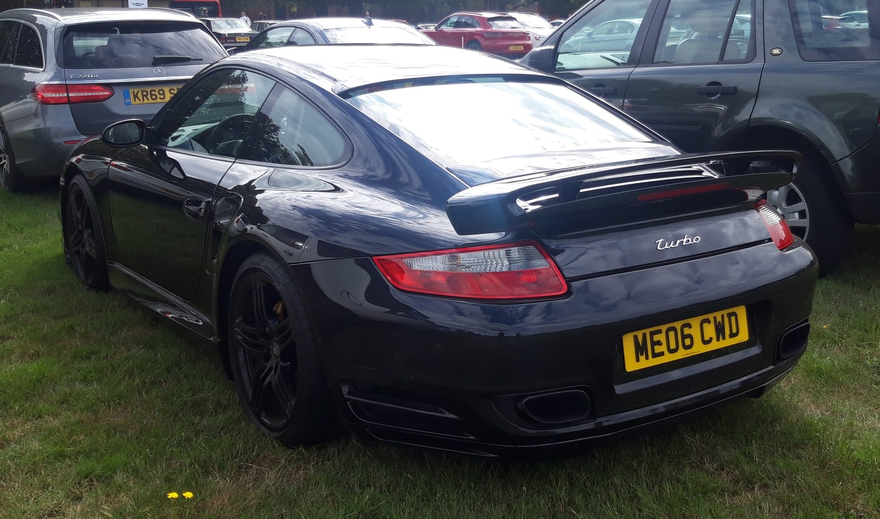 Porsche 997 Turbo rear wing, exhaust, and rear-haunch detail