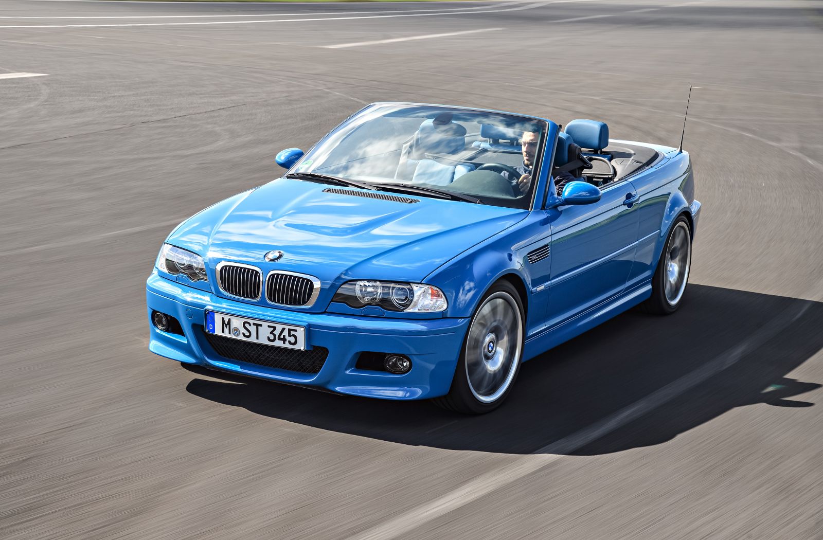 BMW E46 M3 rear three-quarter in Phoenix Yellow